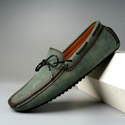 Elegant men's black slip-on loafers, versatile for office, formal or casual wear, offering superior comfort & style.