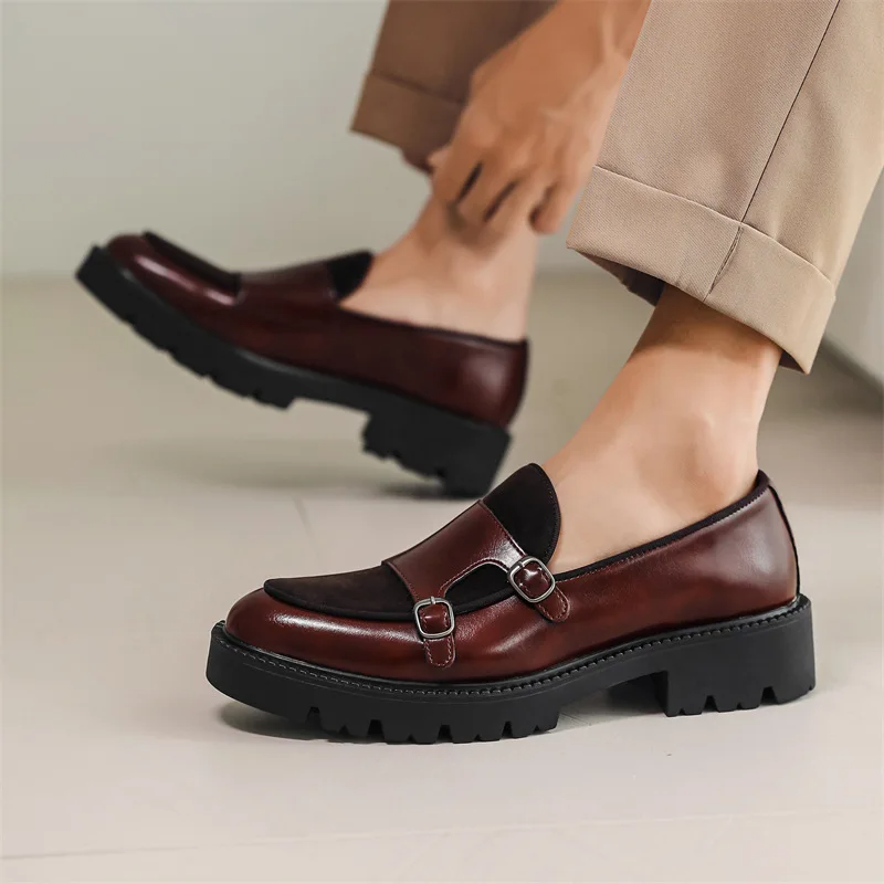 Stylish black monk strap dress shoes for men, ideal for formal or smart casual business attire.