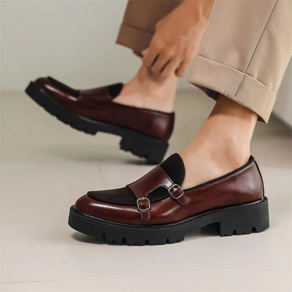 Stylish black monk strap dress shoes for men, ideal for formal or smart casual business attire.