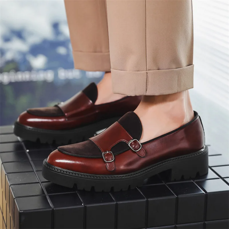 Close-up of a sophisticated monk strap buckle on men's formal dress shoes.