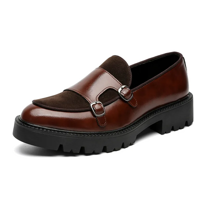Fashionable black monk strap shoes, a comfortable slip-on choice for business and casual wear.