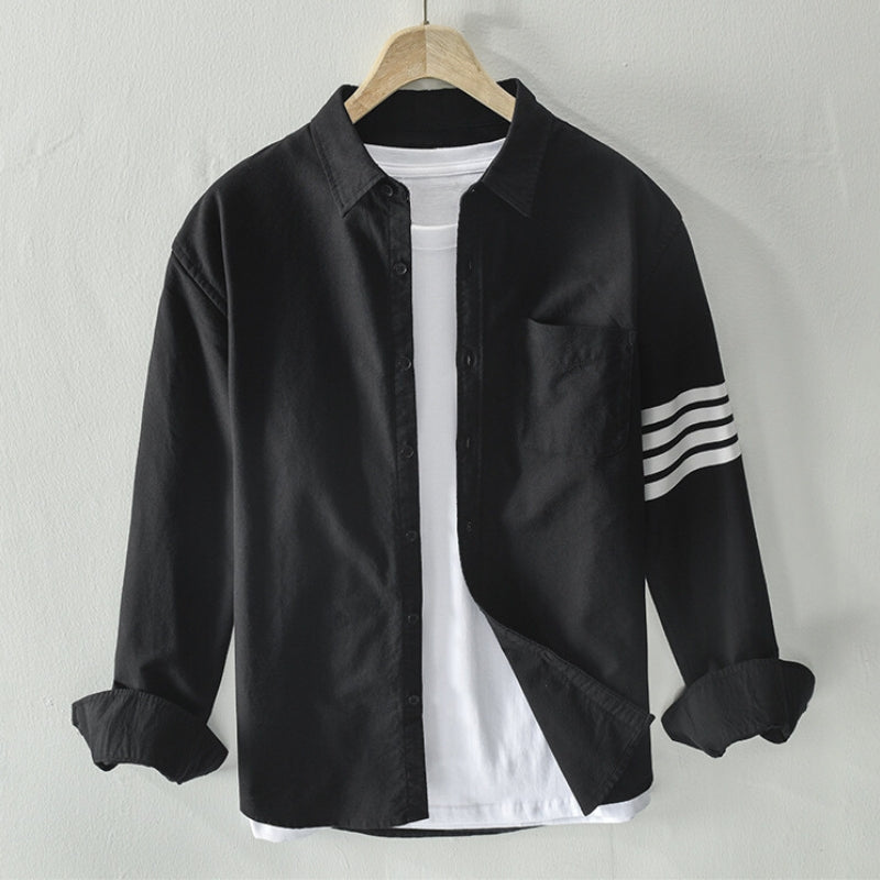 Stylish men's long-sleeve shirt, a classic button-up design perfect for casual everyday fashion.