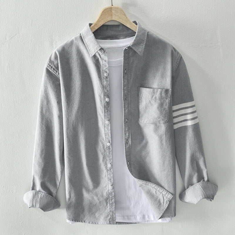 Everyday men's button-up shirt in a classic long-sleeve style, suitable for versatile casual and smart outfits.