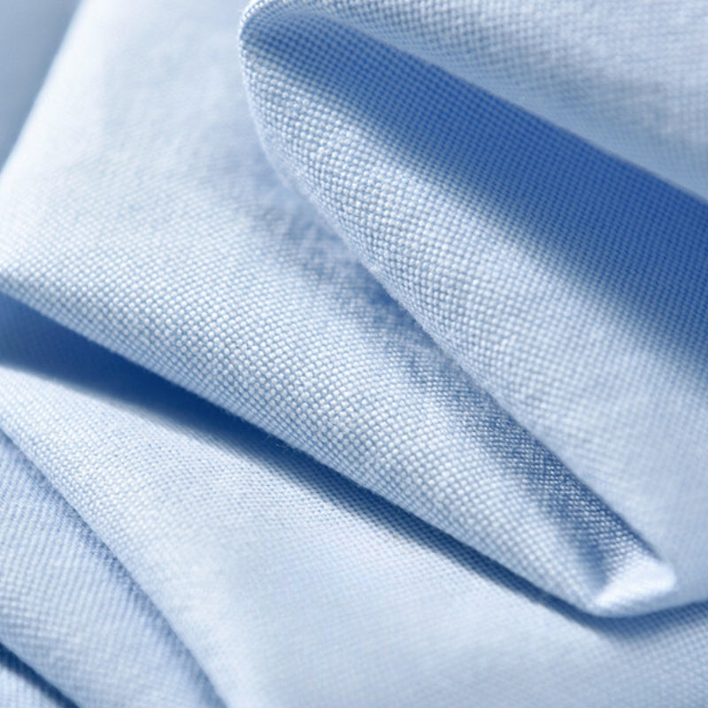 Classic men's fashion button-up shirt with a chest pocket, offering versatile long-sleeve comfort for daily wear.
