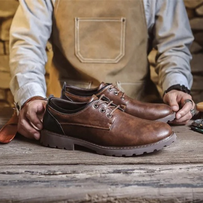 Side profile of classic Men's Cedar Ridge Oxford shoes, showcasing their timeless design.