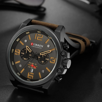 Men's classic chronograph watch on wrist, stylish leather band. Perfect mens fashion timepiece.