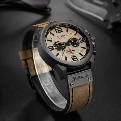 Men's chronograph watch in luxury box. Classic design with leather band. Premium timepiece gift.