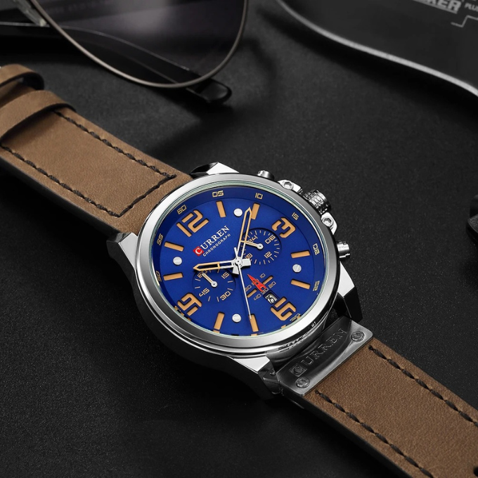 Durable men's classic chronograph watch, water-resistant, sturdy stainless steel case & leather strap.