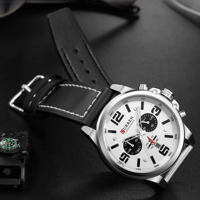 Elegant men's chronograph watch, combining classic design with modern functionality and a soft leather band.