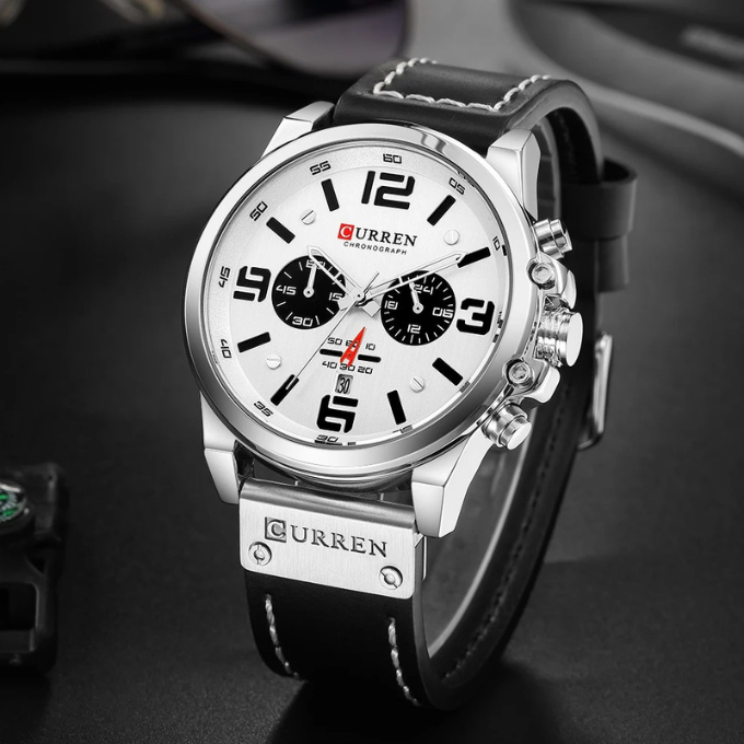 Professional men's chronograph watch, perfect for business attire. Sophisticated leather band timepiece.