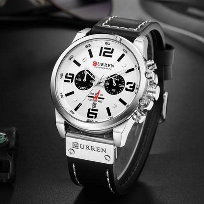 Professional men's chronograph watch, perfect for business attire. Sophisticated leather band timepiece.