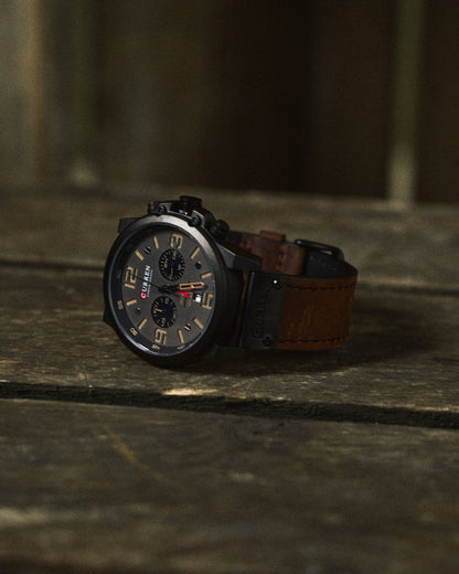 Water-resistant men's chronograph timepiece. Durable stainless steel case, genuine leather strap.