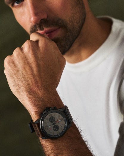 Stylish classic men's chronograph watch with sophisticated leather band. Essential mens fashion accessory.