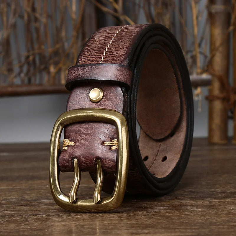 Bold red full-grain leather belt for men, a durable and classic accessory with a brass buckle.