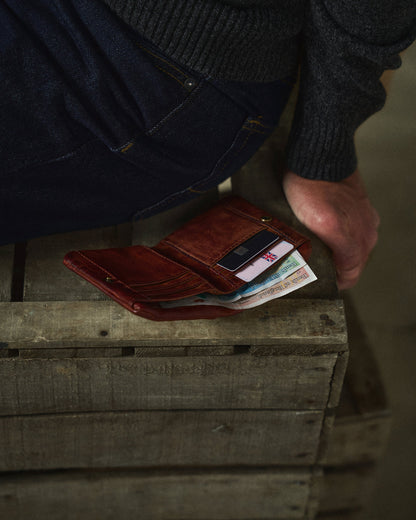 Elegant full-grain leather bifold wallet for men, combining durability with a timeless design.