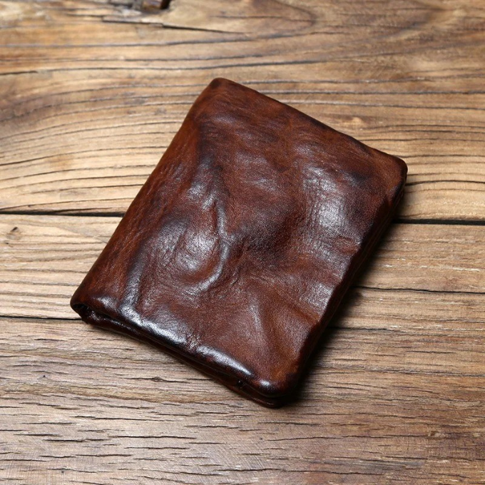 Gift for him: Durable full-grain leather men's bifold wallet in a classic style.