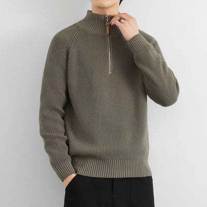 Stylish men's heritage half-zip sweater in a timeless design. Comfortable long-sleeve winter wear for men.