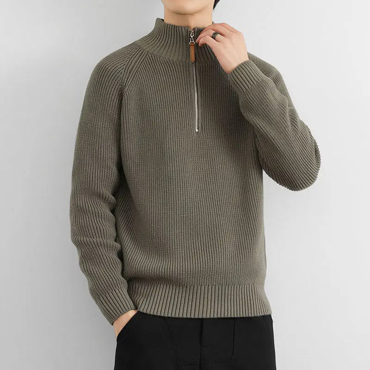 Stylish men's heritage half-zip sweater in a timeless design. Comfortable long-sleeve winter wear for men.