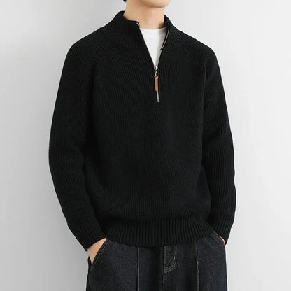 Model wearing a classic men's heritage half-zip sweater, showcasing its stylish fit and versatile look.