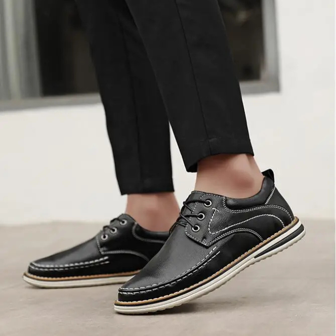 Textured leather men's black moc toe oxfords, delivering sophisticated and elegant style.