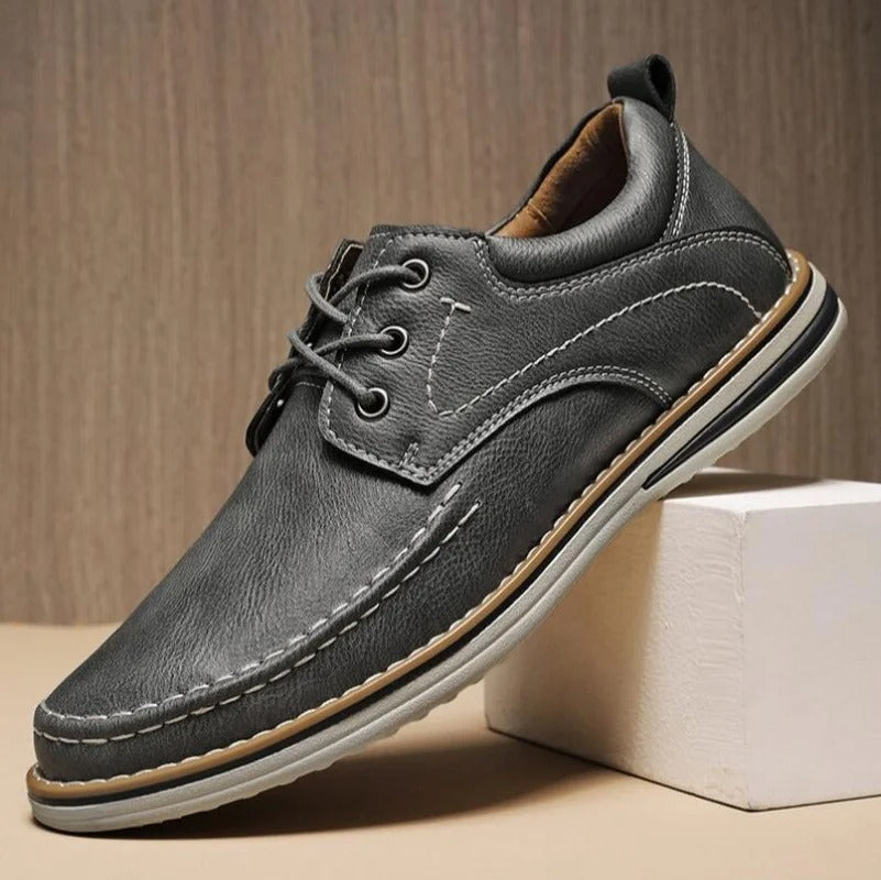 Men's dressy brown moc toe oxford shoes, perfect for professional and formal settings.