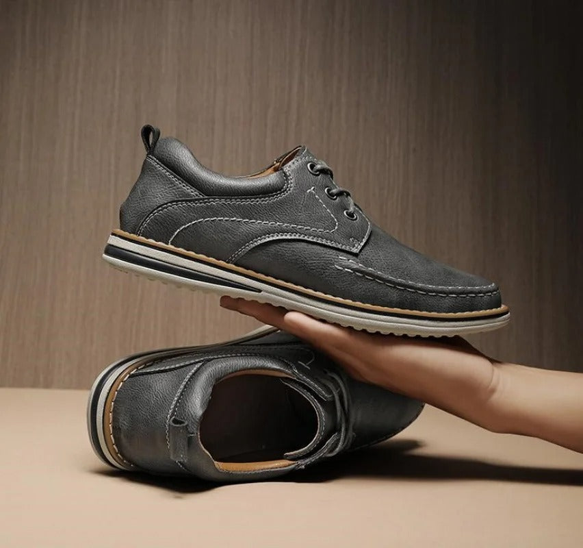 Tan leather moc toe oxfords for men, offering a refined look for any occasion.