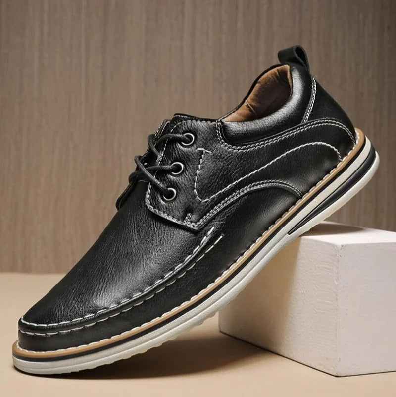 High-quality men's black leather moc toe oxfords, showcasing craftsmanship and classic design.