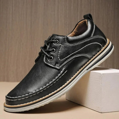 High-quality men's black leather moc toe oxfords, showcasing craftsmanship and classic design.