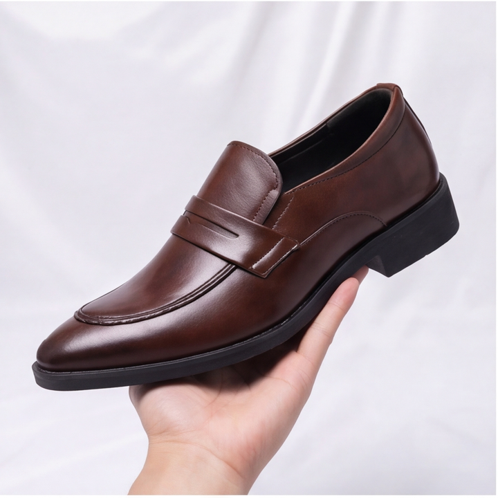 Elegant black men's penny loafers, ideal for both dressy occasions and casual everyday fashion.