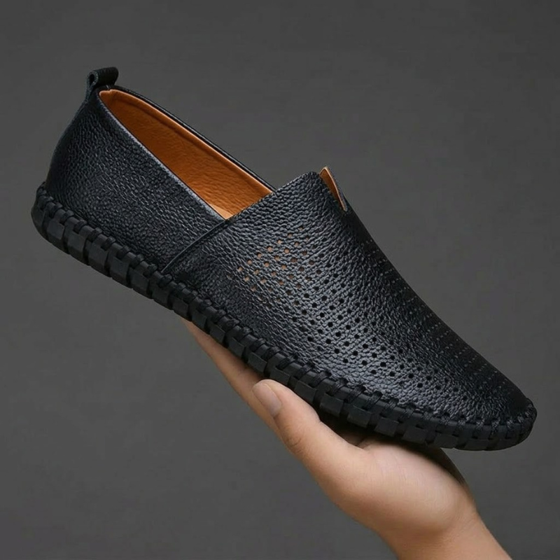 Versatile men's classic perforated slip-on loafers; combine comfort with dress shoe style.