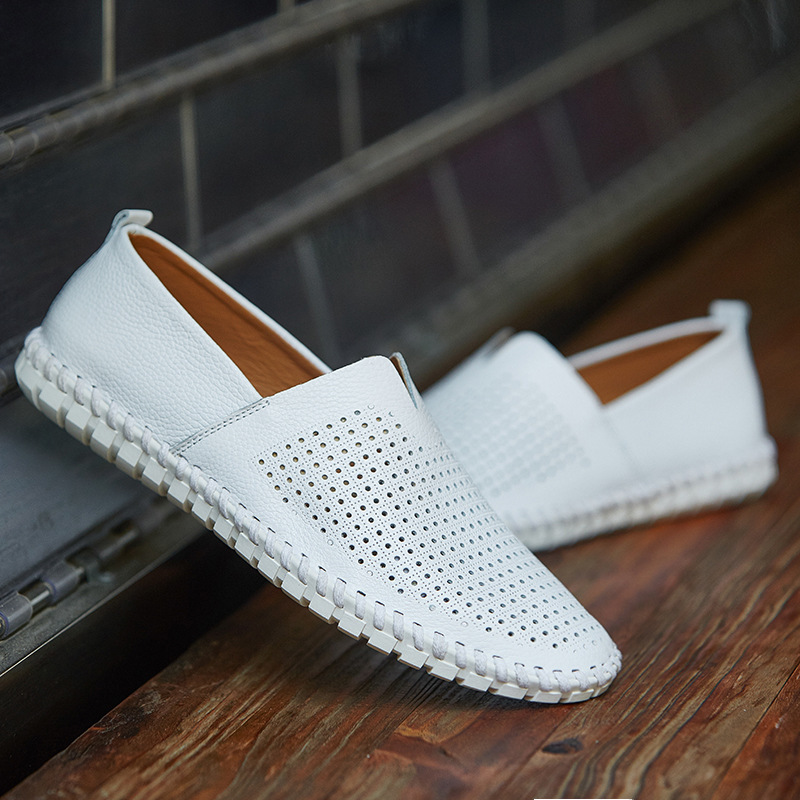 High-quality men's slip-on loafers with classic perforated detail, a versatile wardrobe staple.