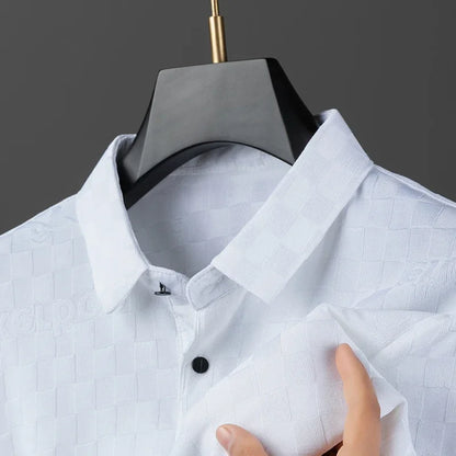 Comfort fit men's basic short sleeve polo shirt, offering effortless style for any occasion.