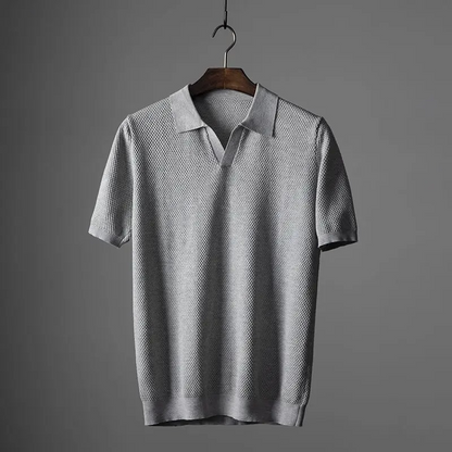 Close-up of the breathable, soft fabric of the men's comfort polo shirt, ideal for versatile casual styling.