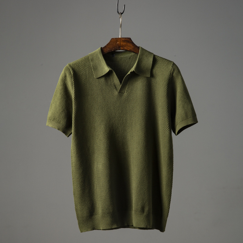 Stylish man wearing a classic short sleeve polo shirt, demonstrating its casual comfort and versatility for everyday use.