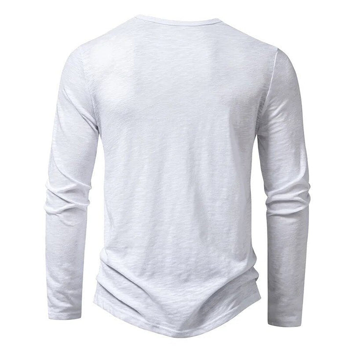Essential men's long sleeve henley shirt, slim fit design for a sharp, casual look.