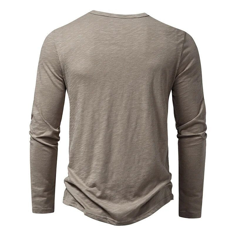 Stylish men's slim fit henley shirt, a comfortable everyday long sleeve top for men.