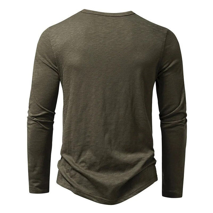 Comfortable men's henley top, long sleeve and slim fit for versatile casual styling.