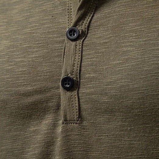 Modern men's slim fit long sleeve henley shirt, excellent for layering or standalone.