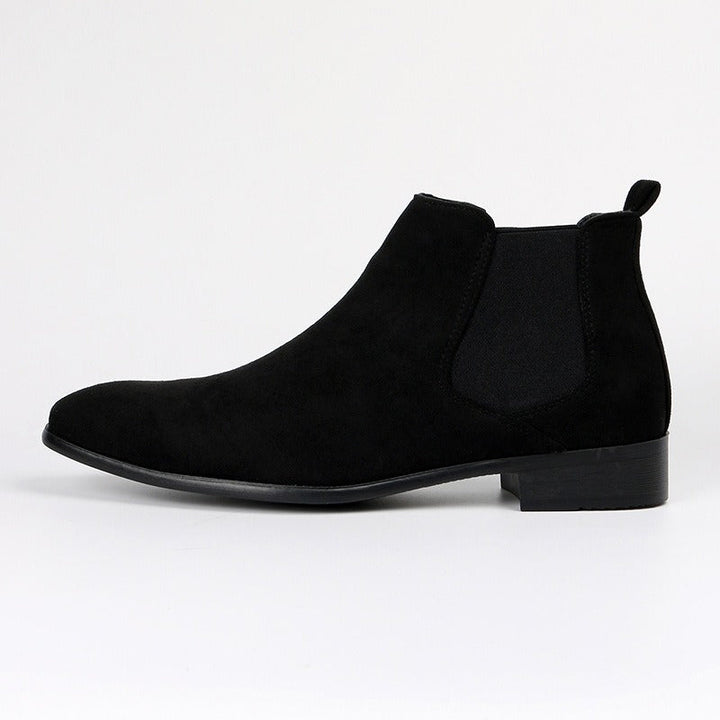 Modern men's fashion: slip-on Chelsea boots with durable sole for active lifestyles.