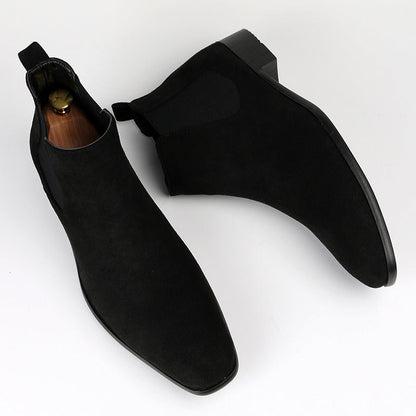 Men's black Chelsea boots for casual footwear, offering easy slip-on convenience.