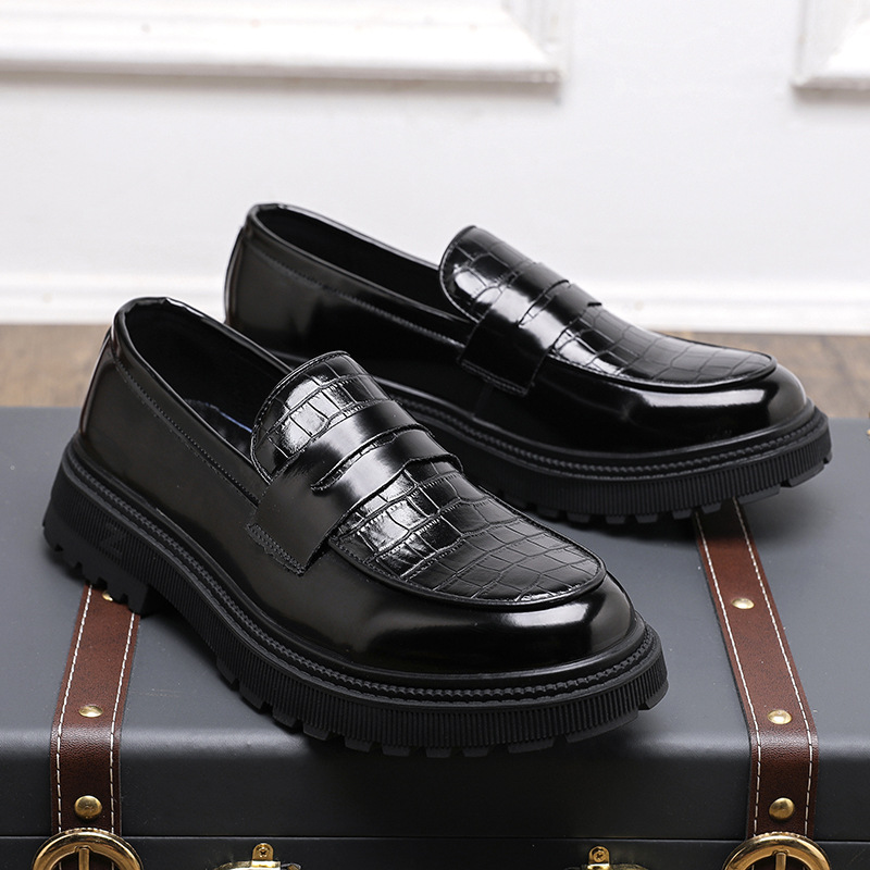 Classic men's slip-on loafers with a polished finish, perfect for dressy or casual everyday wear.