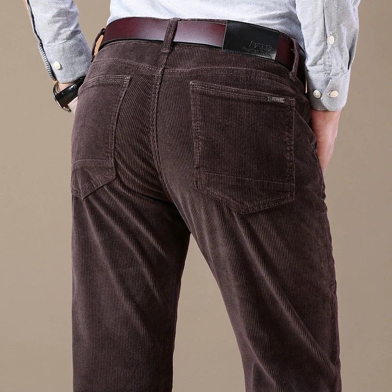 Men's straight-leg jeans, featuring a tailored fit and durable design for timeless casual style.