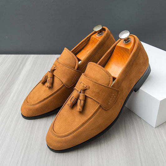 Classic men's tassel loafers, elegant black slip-on dress shoes for formal & business casual wear.