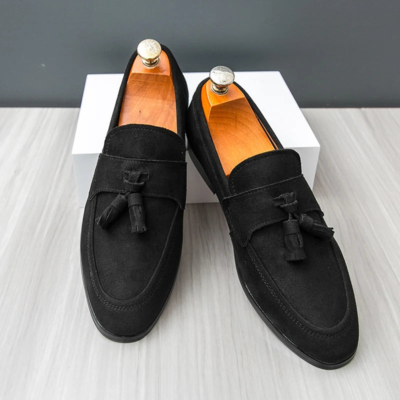 Side profile: Sophisticated men's tassel loafers, comfortable slip-on dress shoes for modern gentlemen.