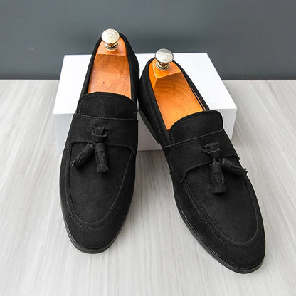 Side profile: Sophisticated men's tassel loafers, comfortable slip-on dress shoes for modern gentlemen.