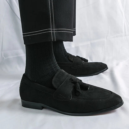 Classic men's tassel loafers, essential elegant slip-on dress shoes for polished business casual looks.