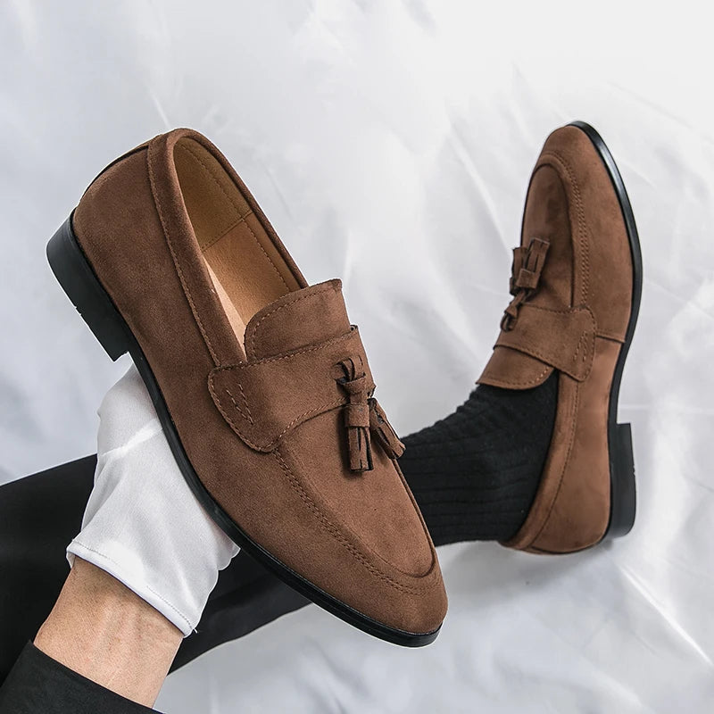 Front view: Men's elegant tassel loafers, classic slip-on footwear perfect for professional & formal wear.
