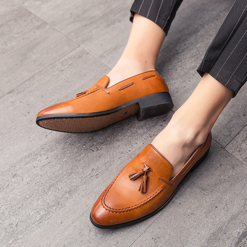 Stylish men's tassel loafers, perfect for a polished smart casual or professional look, comfortable fit.