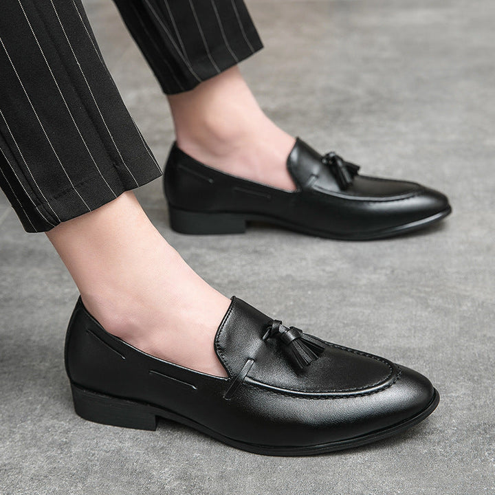 Brown leather men's classic tassel loafers, comfortable and polished, ideal for smart casual attire.