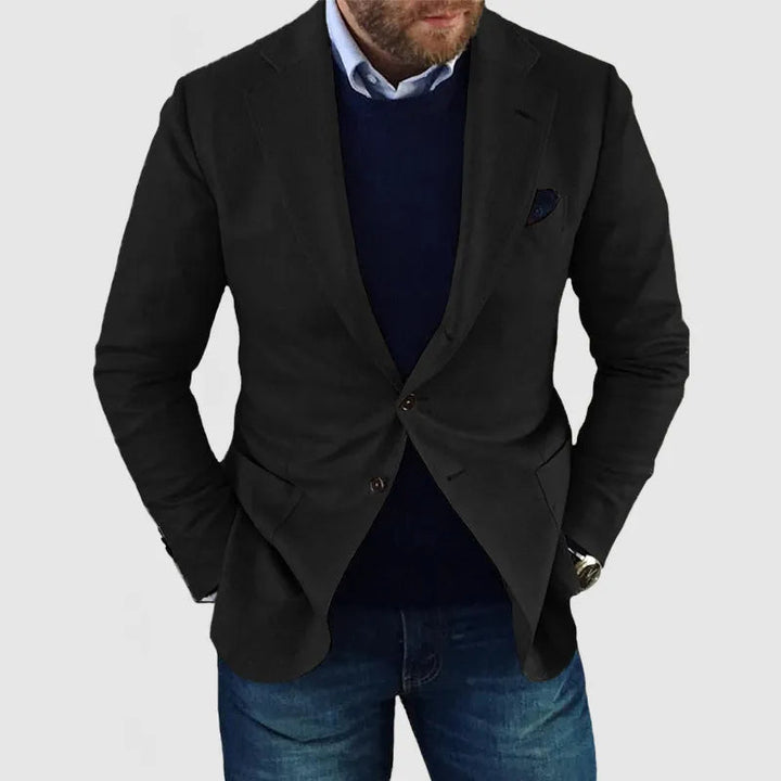 Close-up of a men's classic two-button tailored blazer, showcasing its quality and sophisticated men's fashion style.